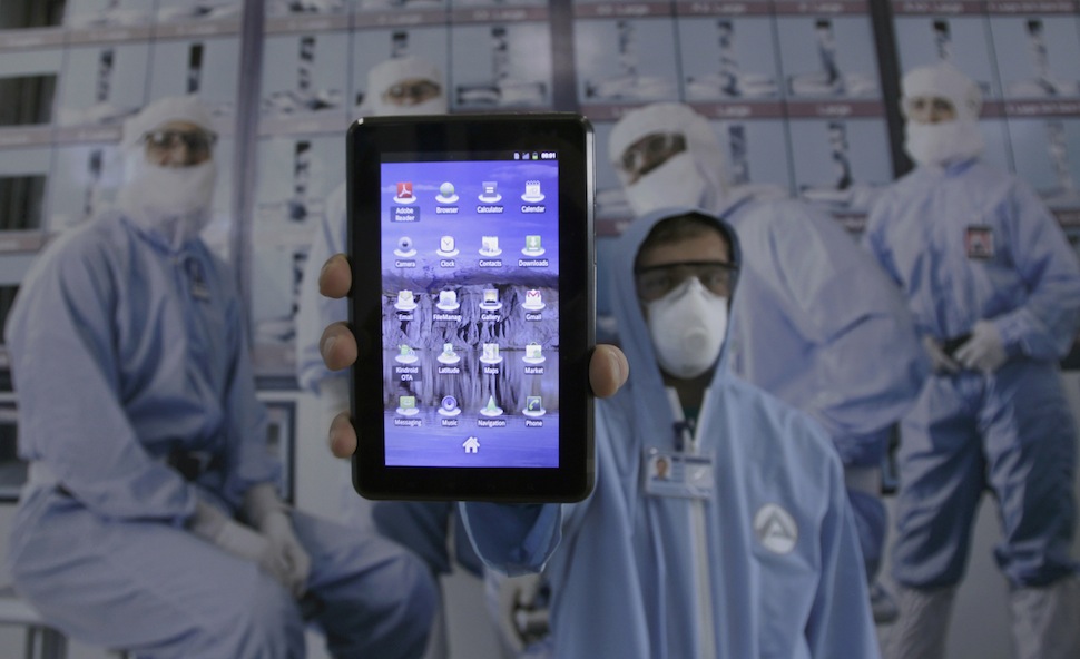 An employee demonstrates a "Police Pad" at the Algorithm factory in Tbilisi