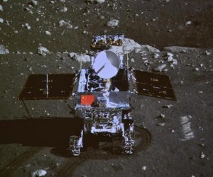 A photograph of the giant screen at the Beijing Aerospace Control Center shows photo of the Yutu, or "Jade Rabbit" lunar rover taken by the camera on the Chang'e 3 probe during the mutual-photograph process, in Beijing