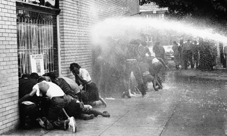 American civil rights protestors are attacked with a water cannon, 1963. Photograph: Getty Images