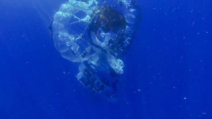 Moments into its powered flight, the LDSD test vehicle captured this image of the balloon which carried it to high altitudes. The image was taken by one of the saucer-shaped test vehicle's high-resolution cameras. Image: NASA/JPL-Caltech