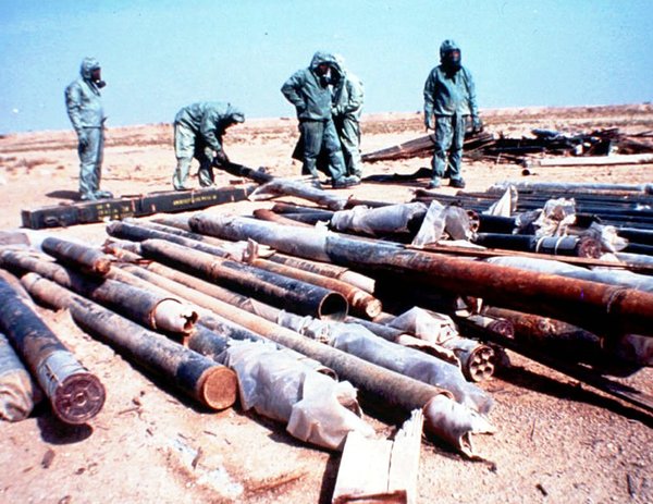 United Nations workers prepared for the destruction of Iraqi nerve-agent weapons by sealing leaks in the rockets. Photo: British Ministry of Defense